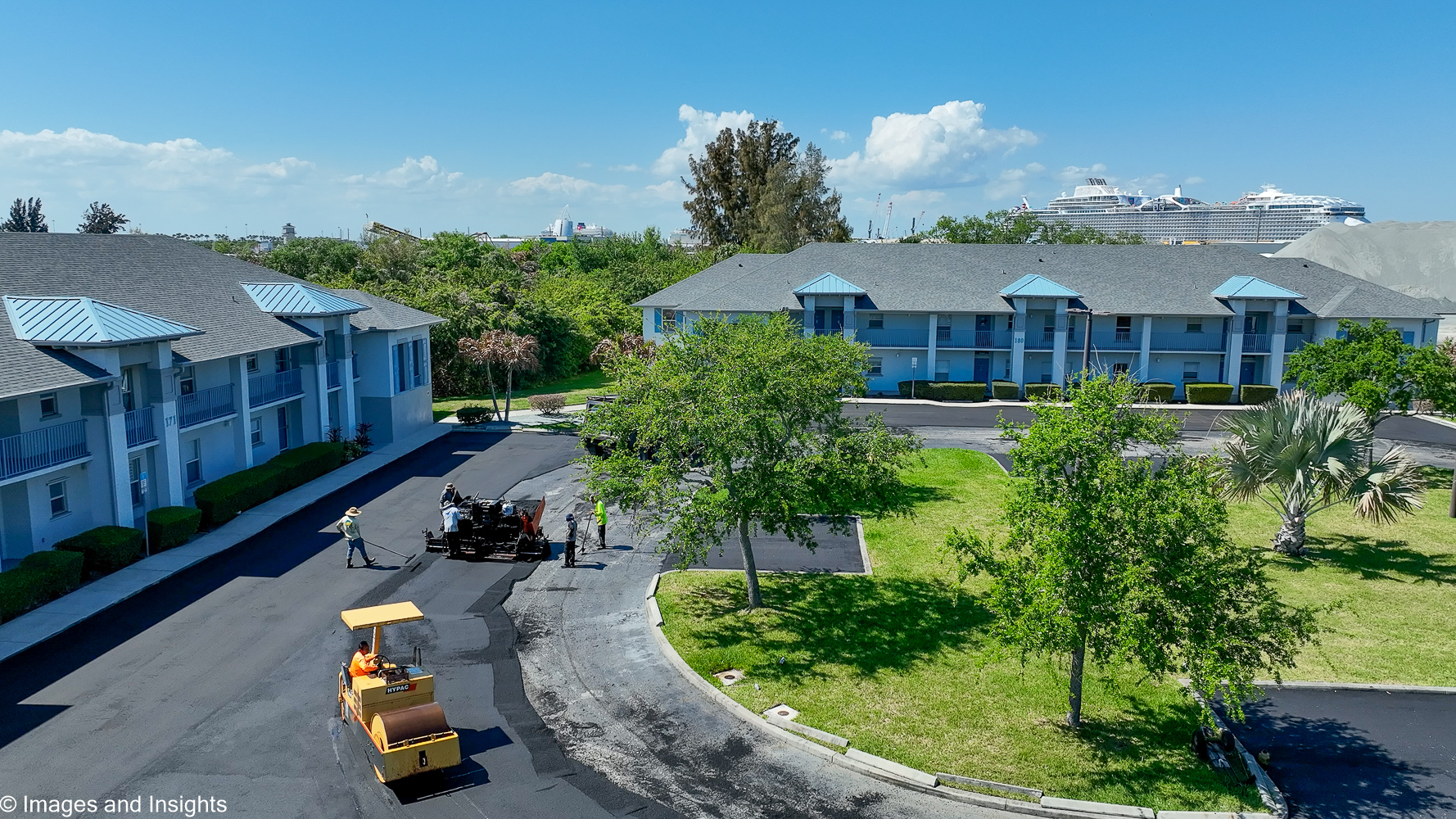 Construction progress drone photography Brevard County — wide aerial view of parking lot project