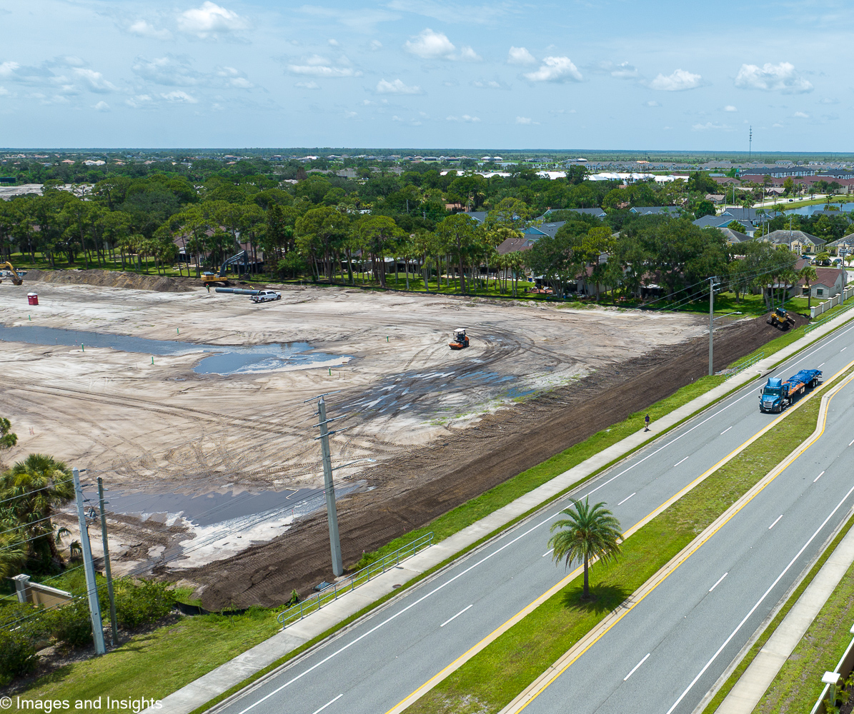 Construction progress drone photography Brevard County — aerial view of site startup