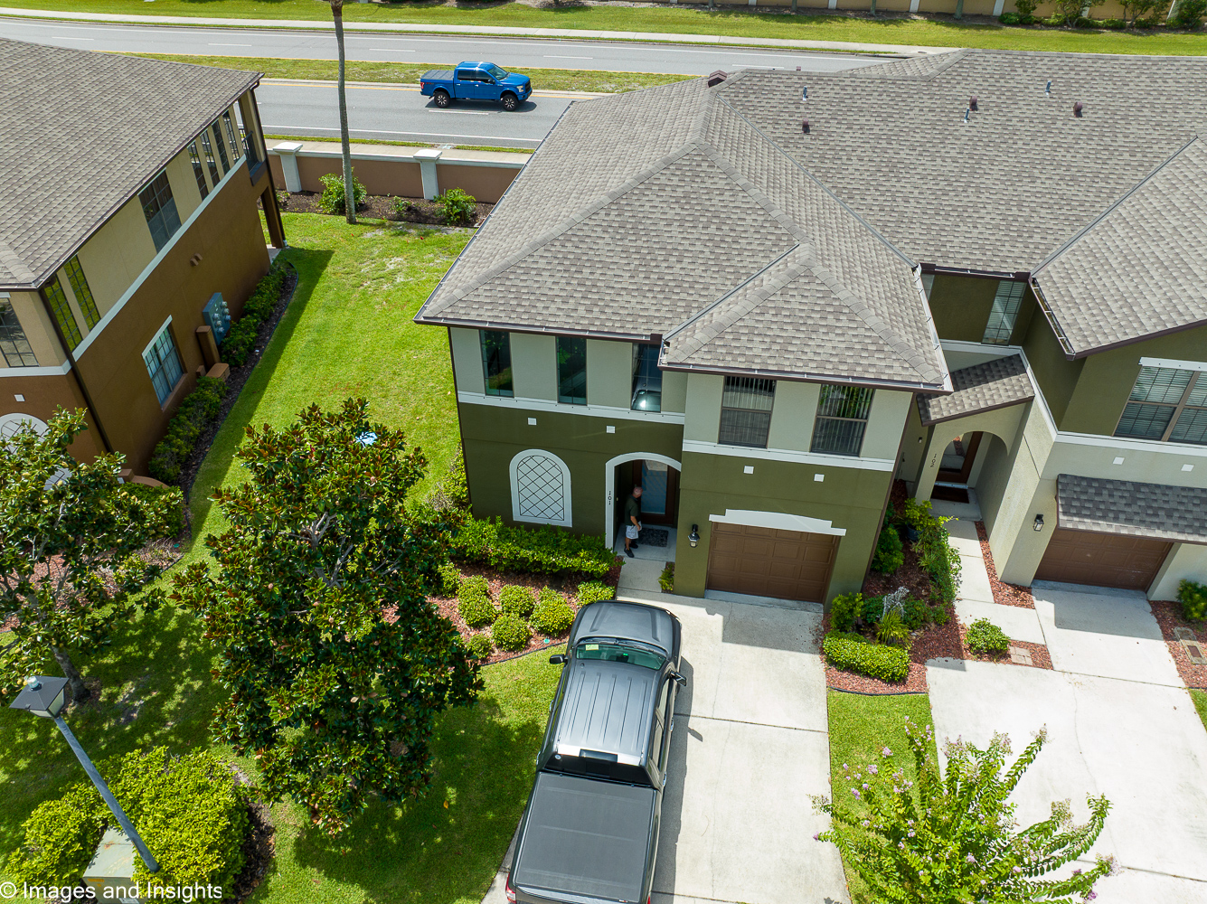 Real estate drone photography Brevard County — aerial view of two-story condominium end unit
